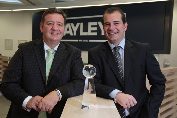 Bayleys Real Estate directors Chris Bayley, left, and Mike Bayley, accept the company's peer recognition accolade for outstanding sales &#8211; awarded by the Royal Institution of Chartered Surveyors.